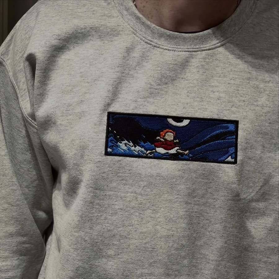 Broderie vague et lune sur sweat